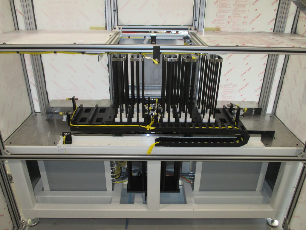Stack indexing machine receives medical devices
