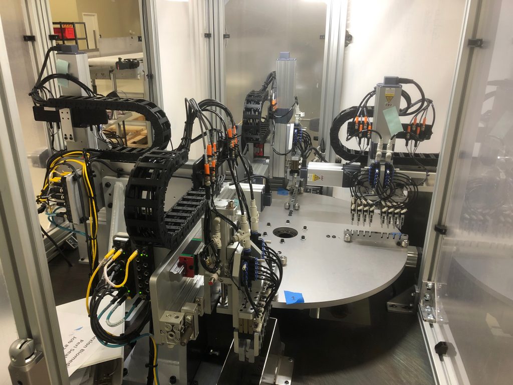 Synchronous machine utilizes 8-up tooling on a 4-station dial